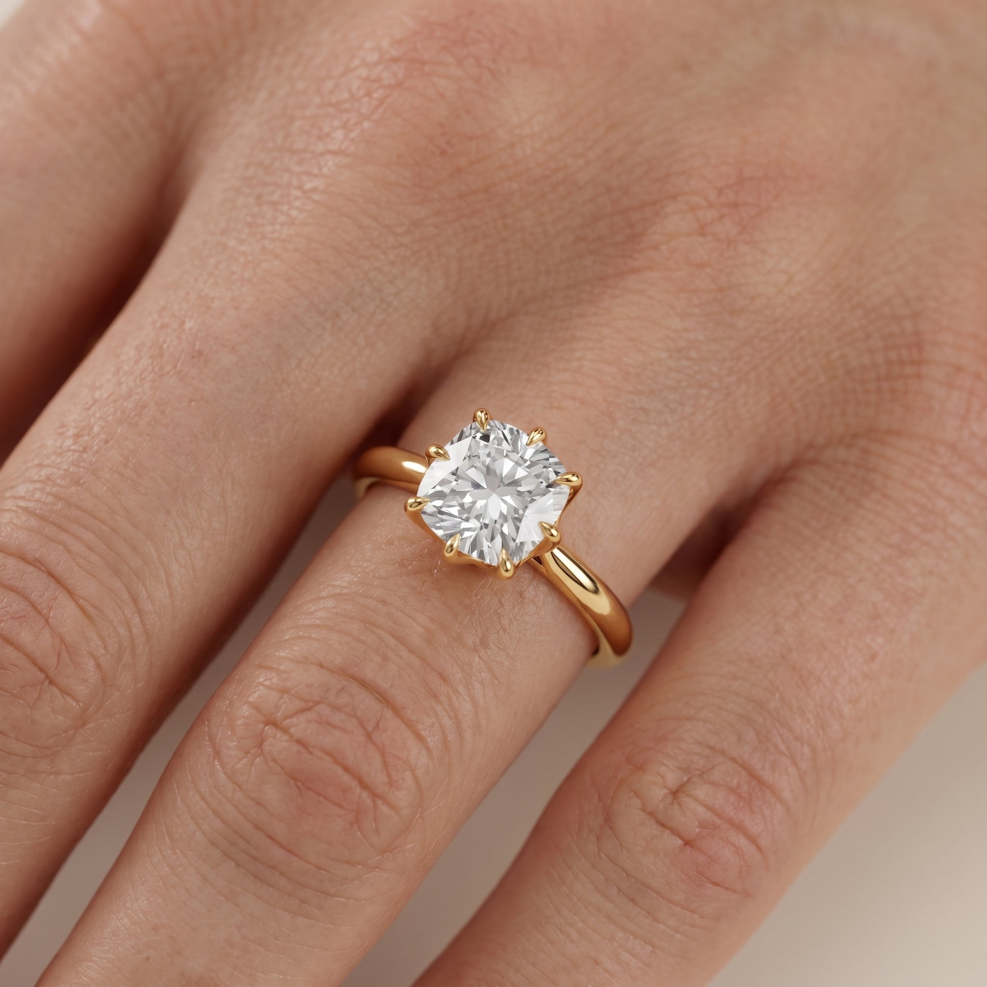 Evie Solitaire Six-Prong Cushion Diamond Engagement Ring in Yellow Gold - lifestyle.jpg