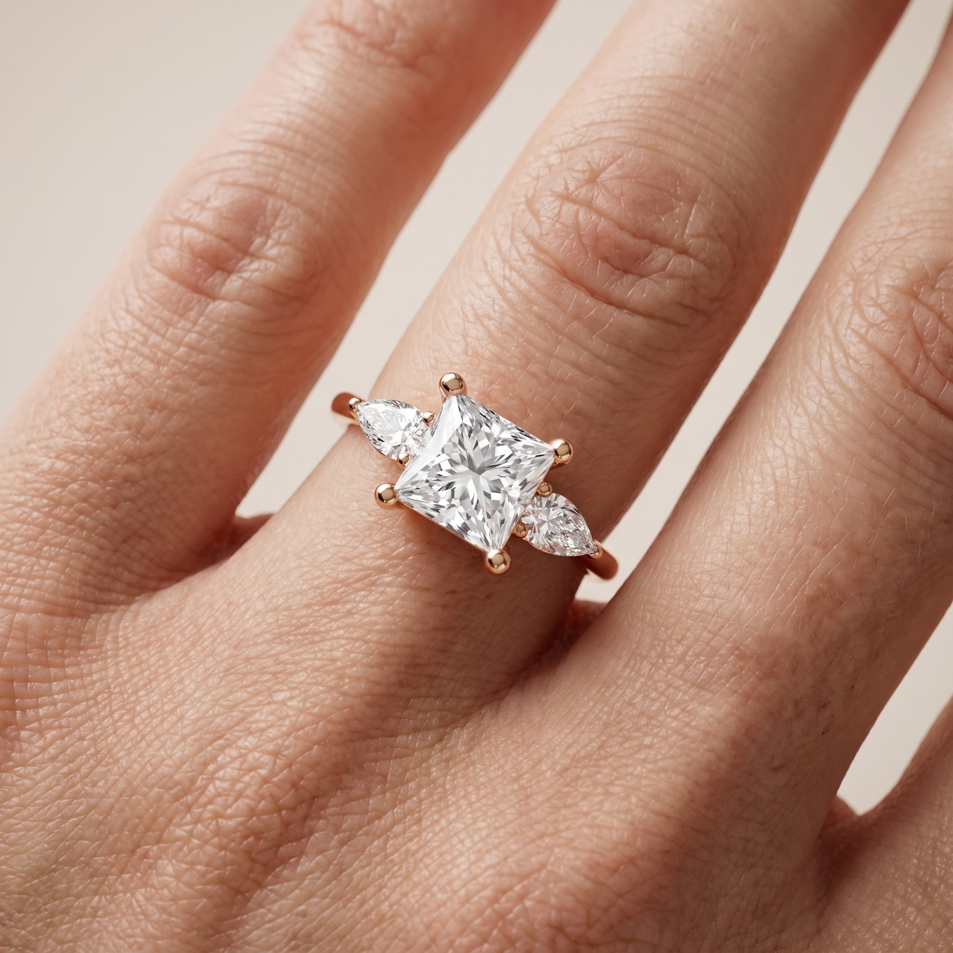 Faye Three-Stone Trellis Princess Diamond Ring in Rose Gold - lifestyle.jpg