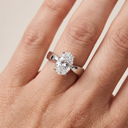 Talia Solitaire Twist Oval Diamond Engagement Ring in Platinum - lifestyle.jpg