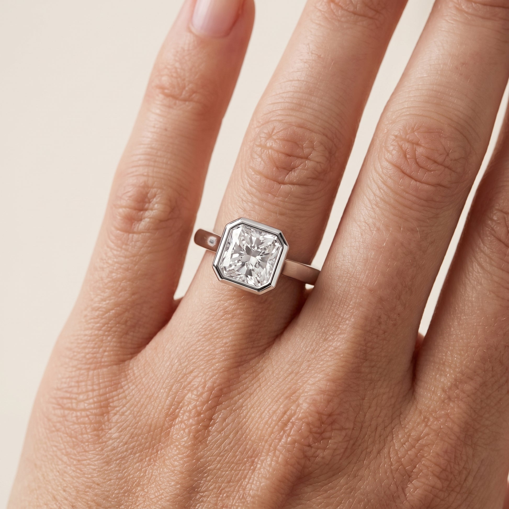 Jolie Bezel Solitaire Radiant Diamond Engagement Ring in Silver - lifestyle.jpg