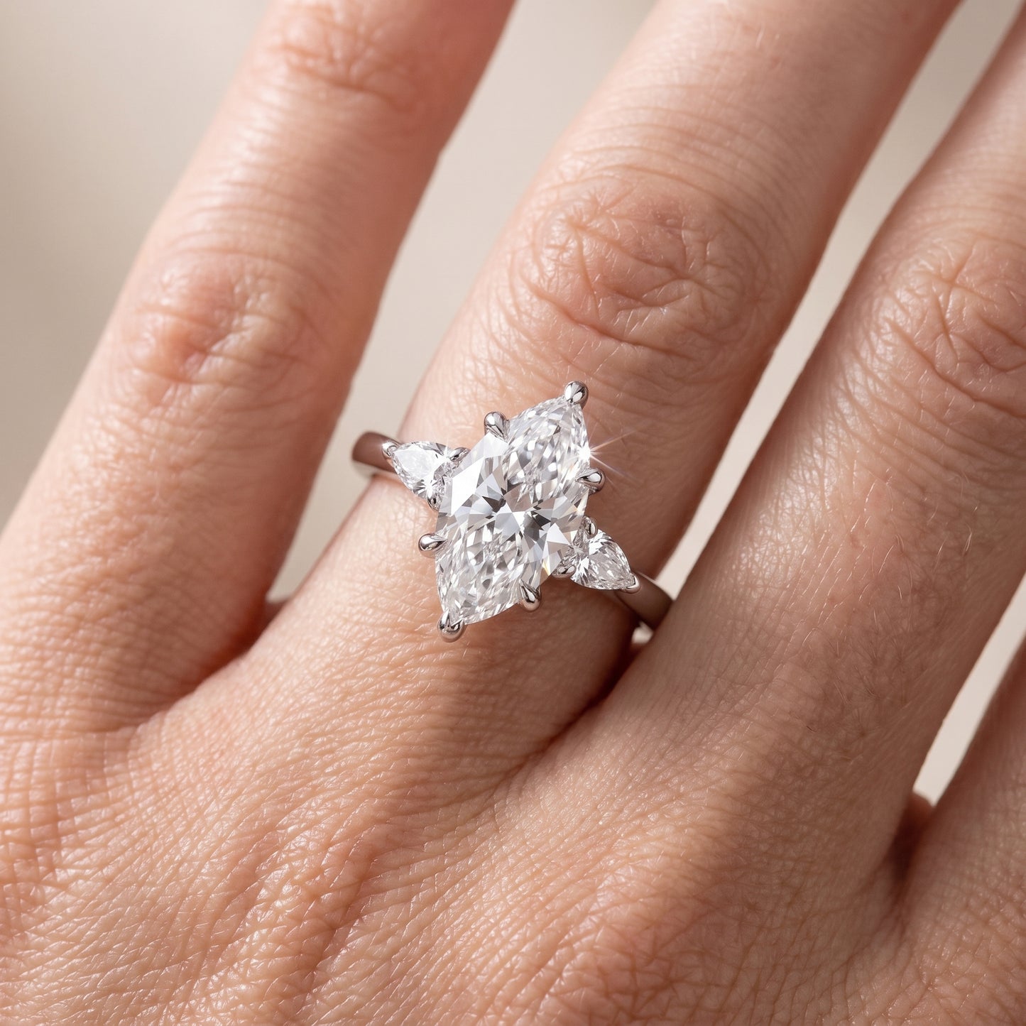 Leila Three-Stone Marquise Diamond Engagement Ring in Platinum - lifestyle.jpg