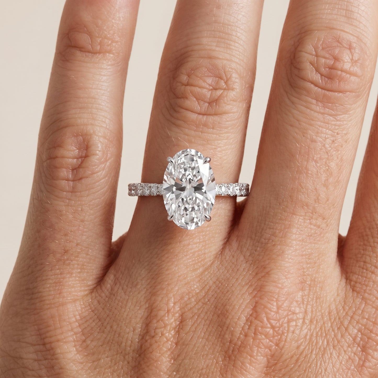 Gia Hidden Halo Pavé Oval Diamond Ring in White Gold - lifestyle.jpg