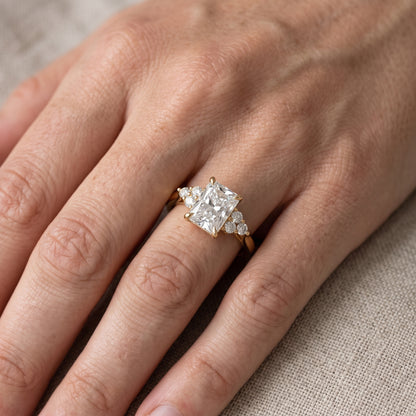 Anya Sidestone Cluster Radiant Diamond Engagement Ring in Yellow Gold - lifestyle.jpg