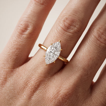 Evie Solitaire Six-Prong Marquise Diamond Engagement Ring in Yellow Gold - lifestyle.jpg