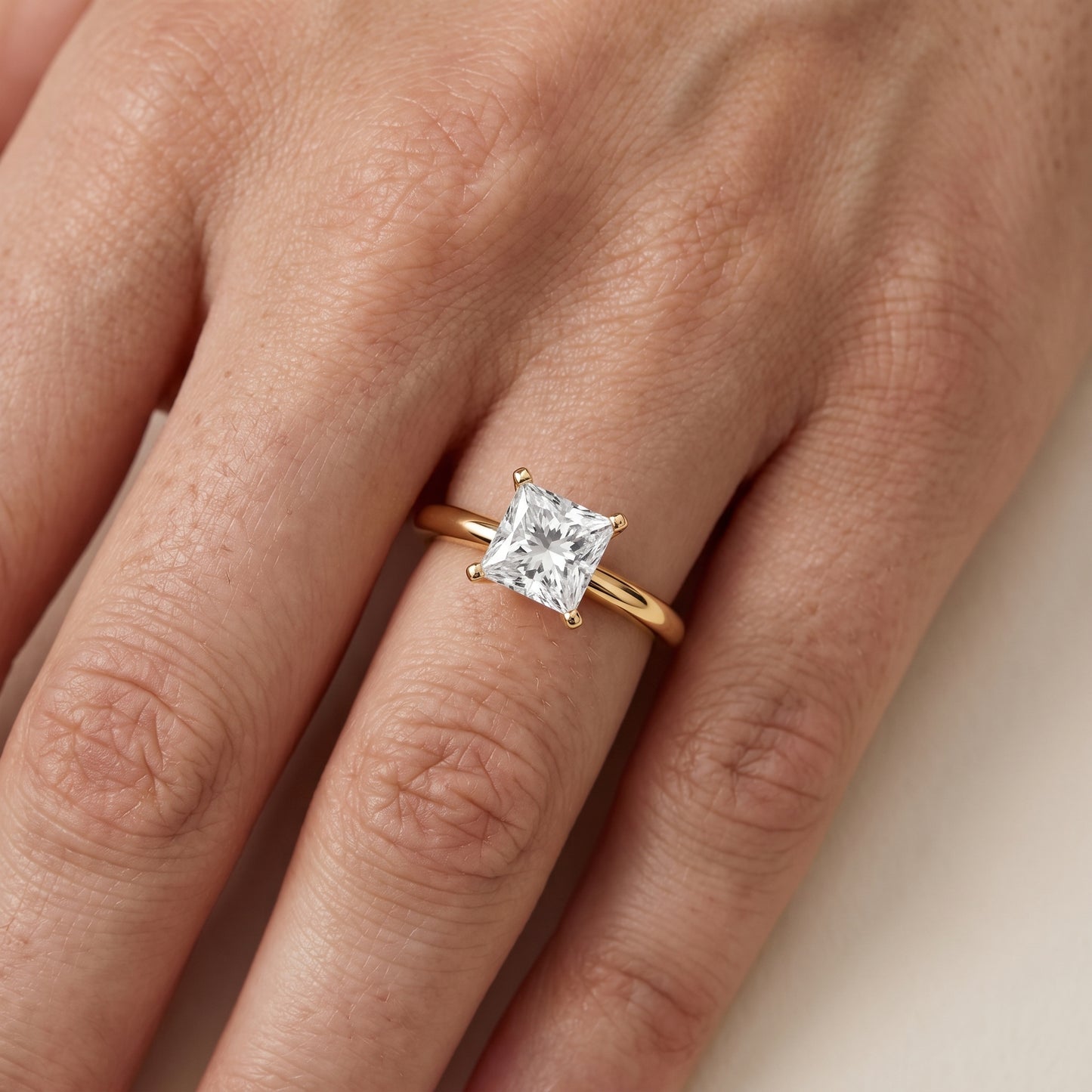 Wren Solitaire Princess Diamond Ring in Yellow Gold - lifestyle.jpg