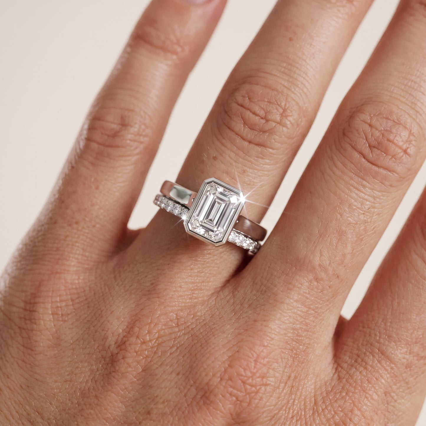 Ayla Bezel Bypass Emerald Diamond Ring in Platinum - lifestyle.jpg