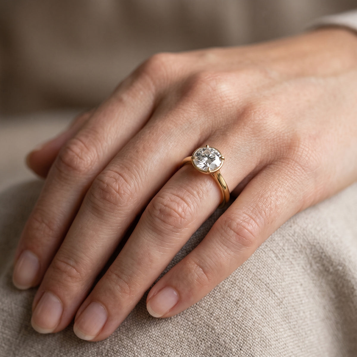 Ashland Basket Solitaire Round Diamond Engagement Ring in Yellow Gold - lifestyle.jpg