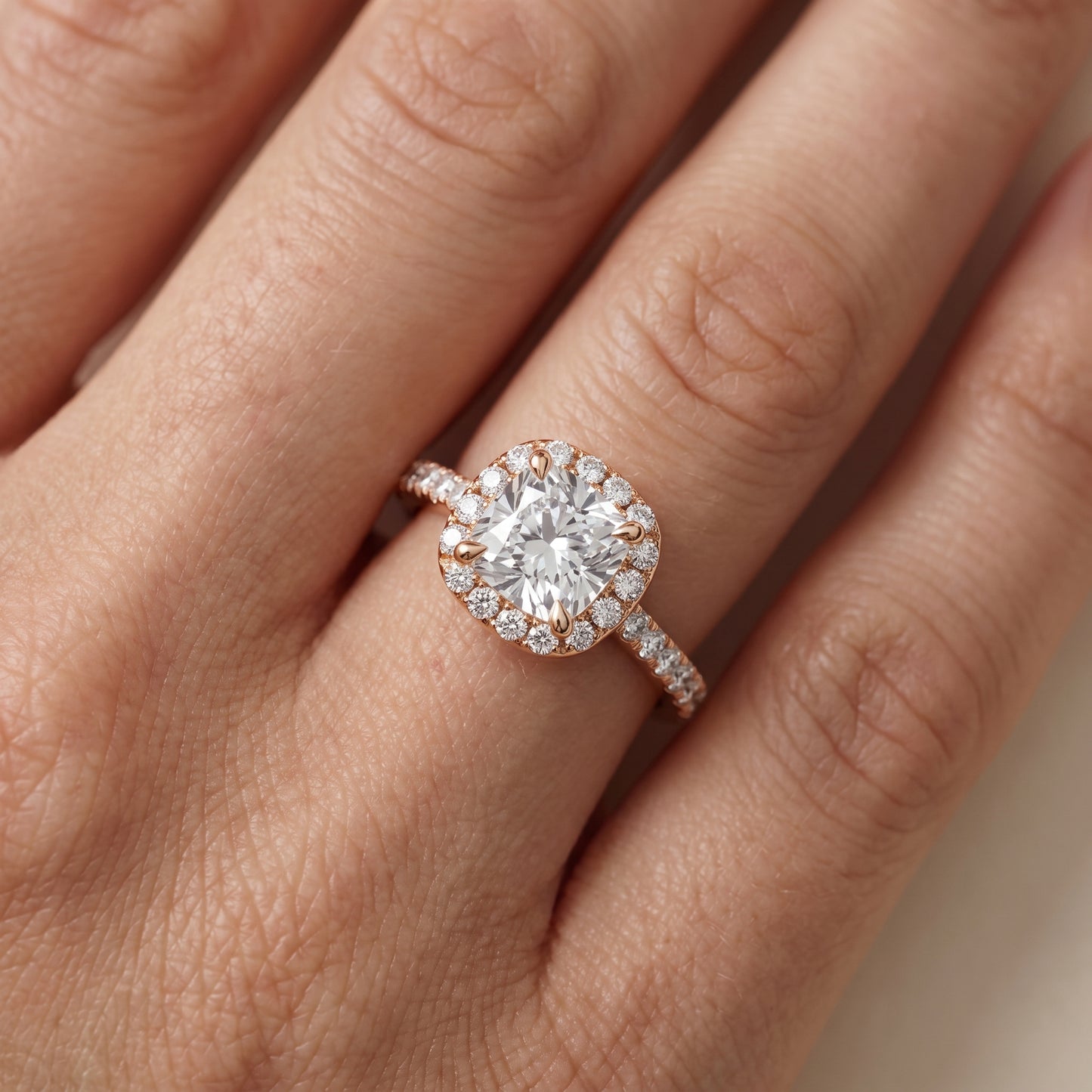 Amara Halo Claw Prong Cushion Diamond Ring in Rose Gold - lifestyle.jpg