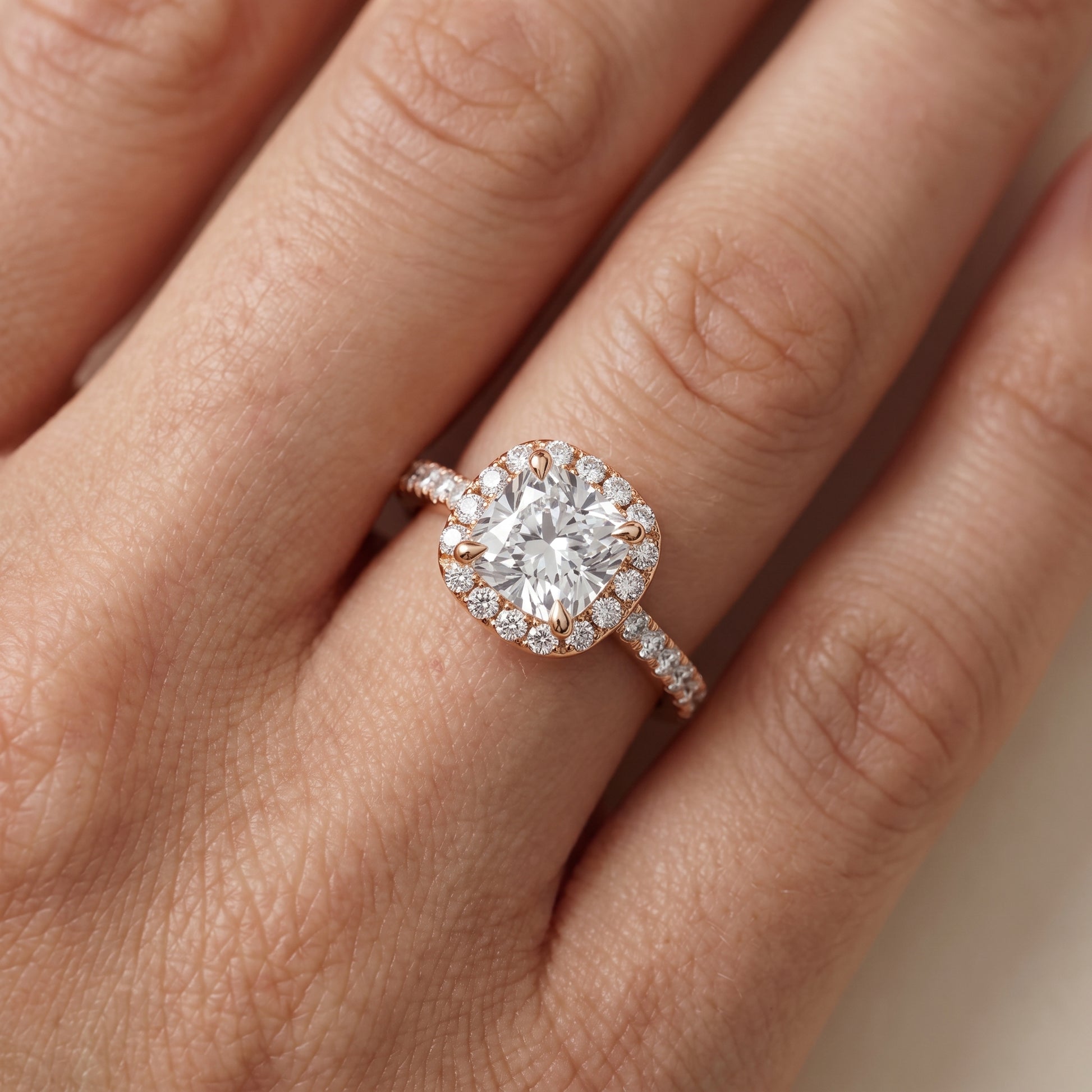 Amara Halo Claw Prong Cushion Diamond Ring in Rose Gold - lifestyle.jpg