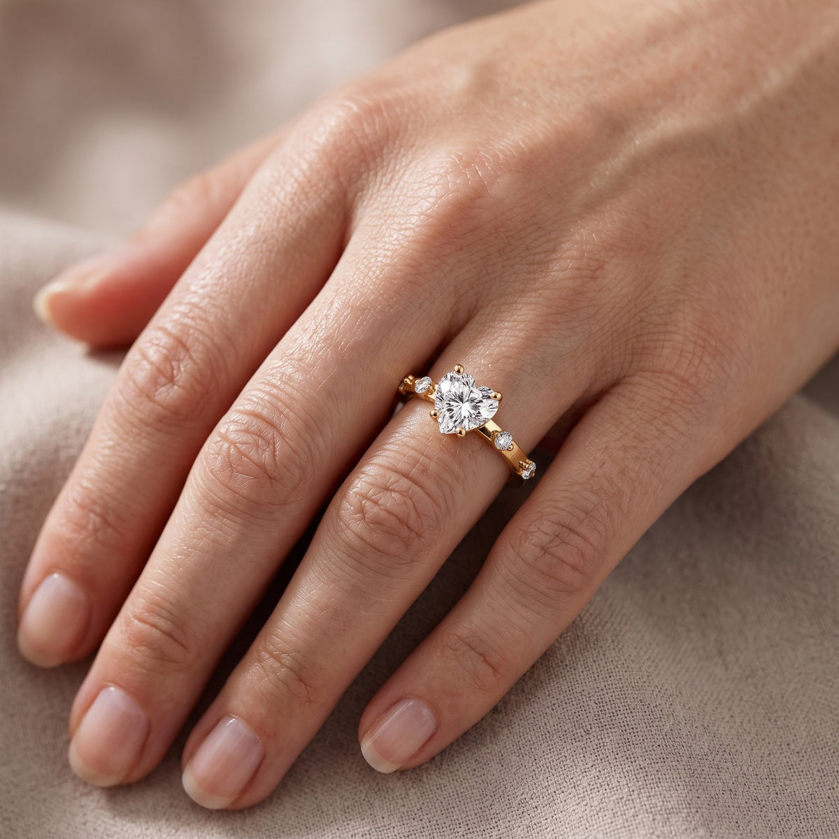 Elena Radiance Solitaire Heart Diamond Engagement Ring in Yellow Gold - lifestyle.jpg