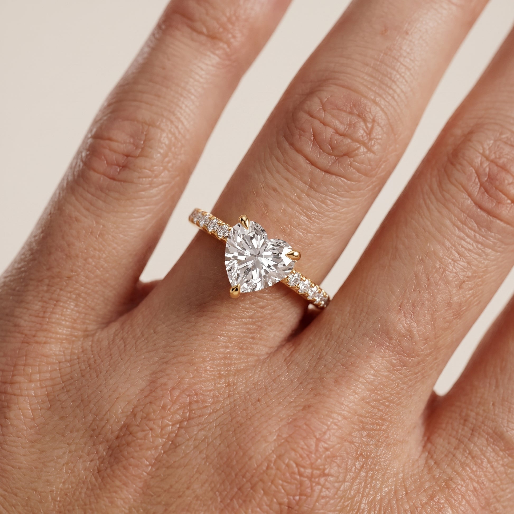 Maya Hidden Halo Pavé Heart Diamond Engagement Ring in Yellow Gold - lifestyle.jpg