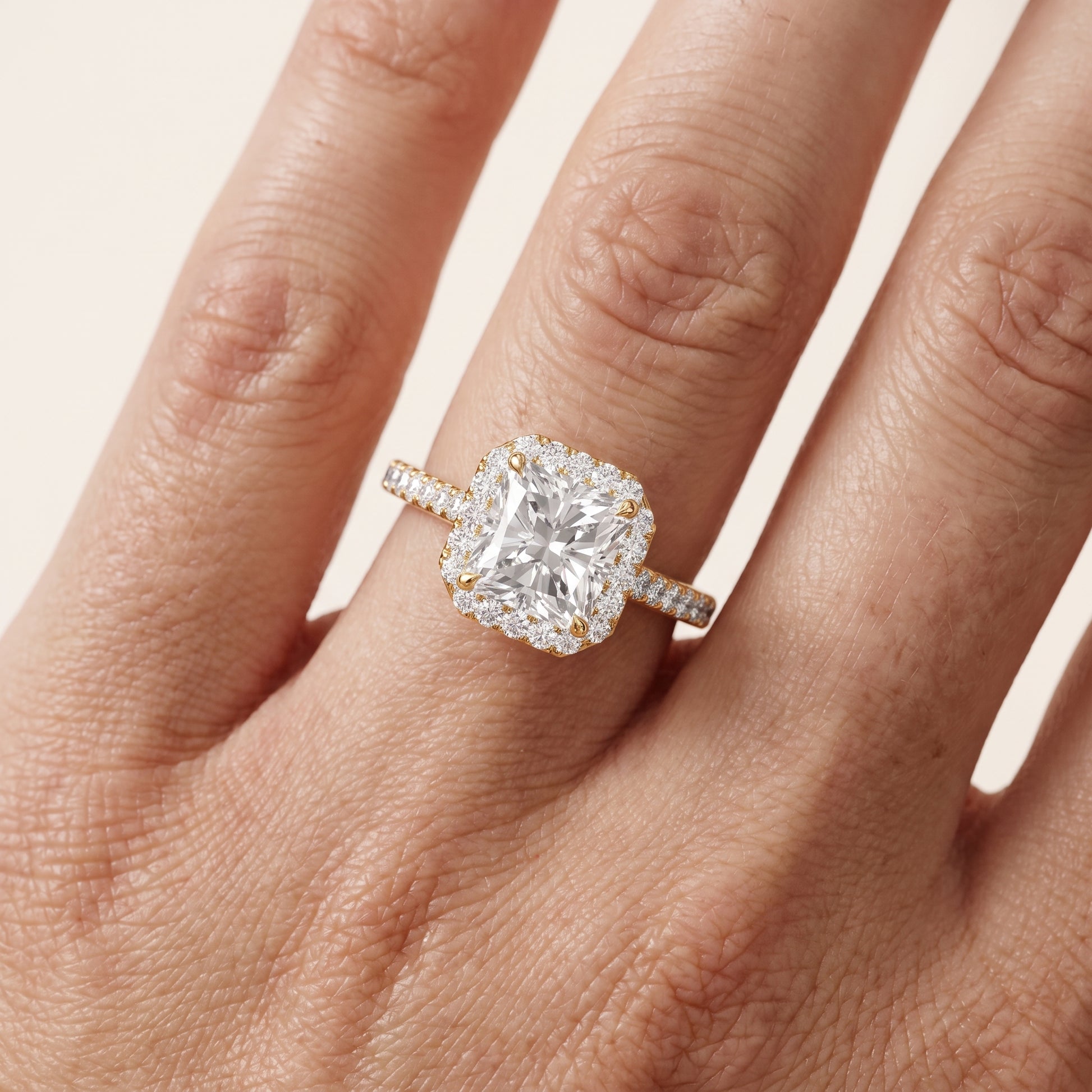 Alma Halo Pavé Radiant Diamond Ring in Yellow Gold - lifestyle.jpg