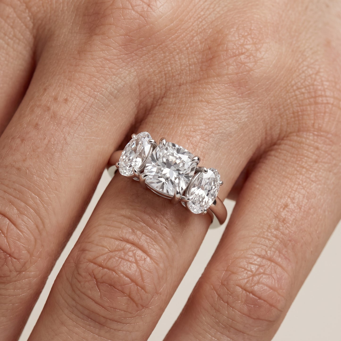 Lila Three-Stone Cushion Diamond Ring in Platinum - lifestyle.jpg