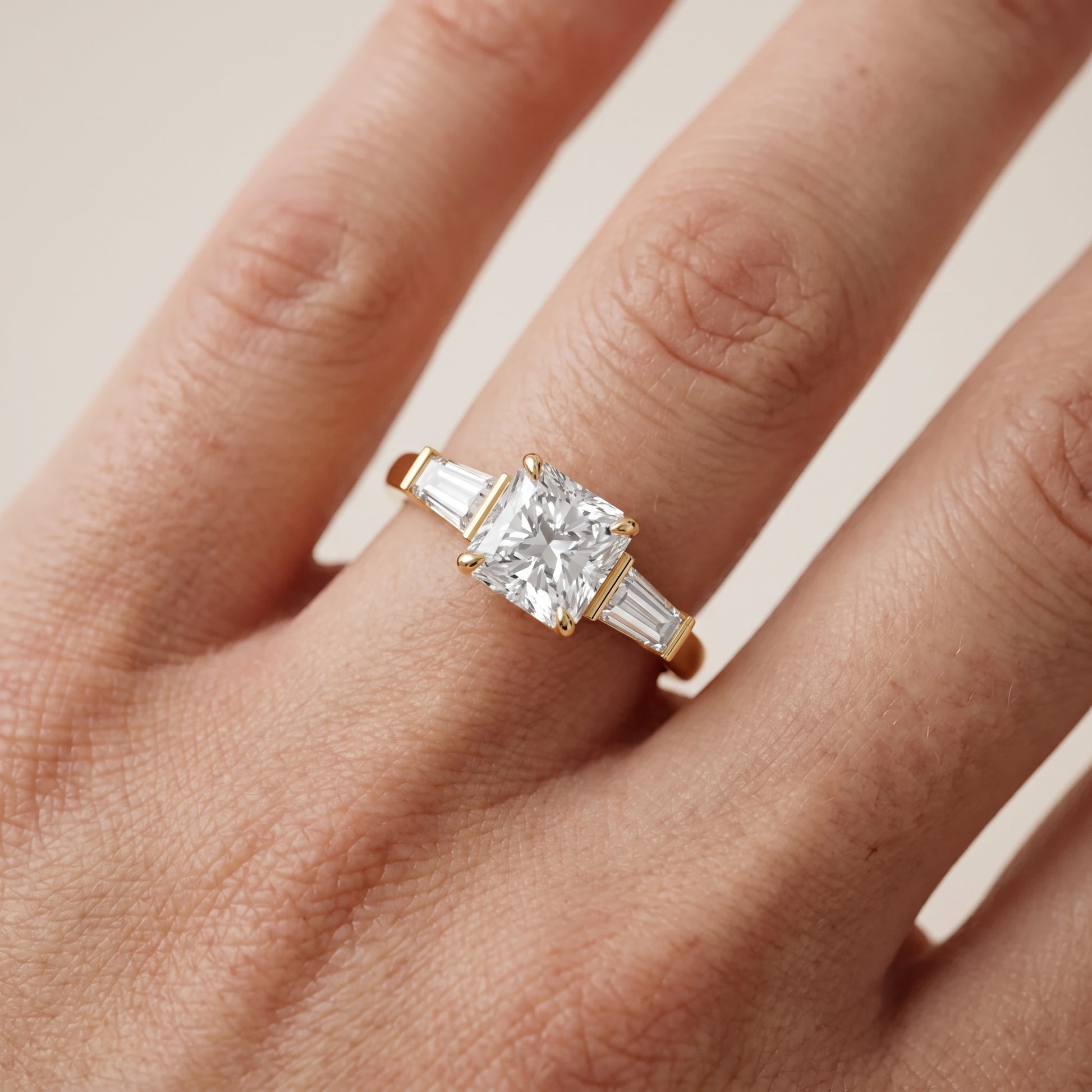 Zelda Tapered Baguette Radiant Diamond Engagement Ring in Yellow Gold - lifestyle.jpg
