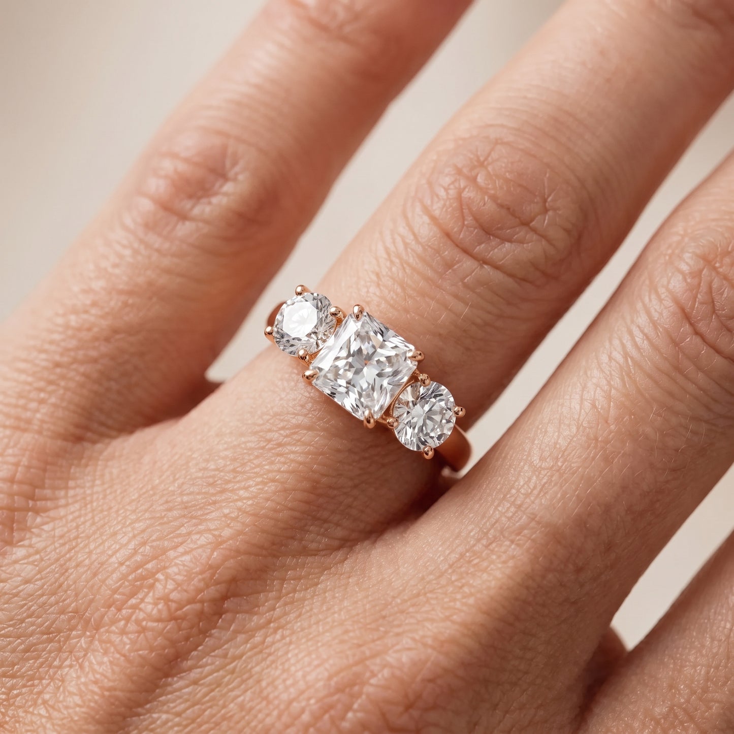 Esme Three-Stone Tapered Radiant Diamond Ring in Rose Gold - lifestyle.jpg