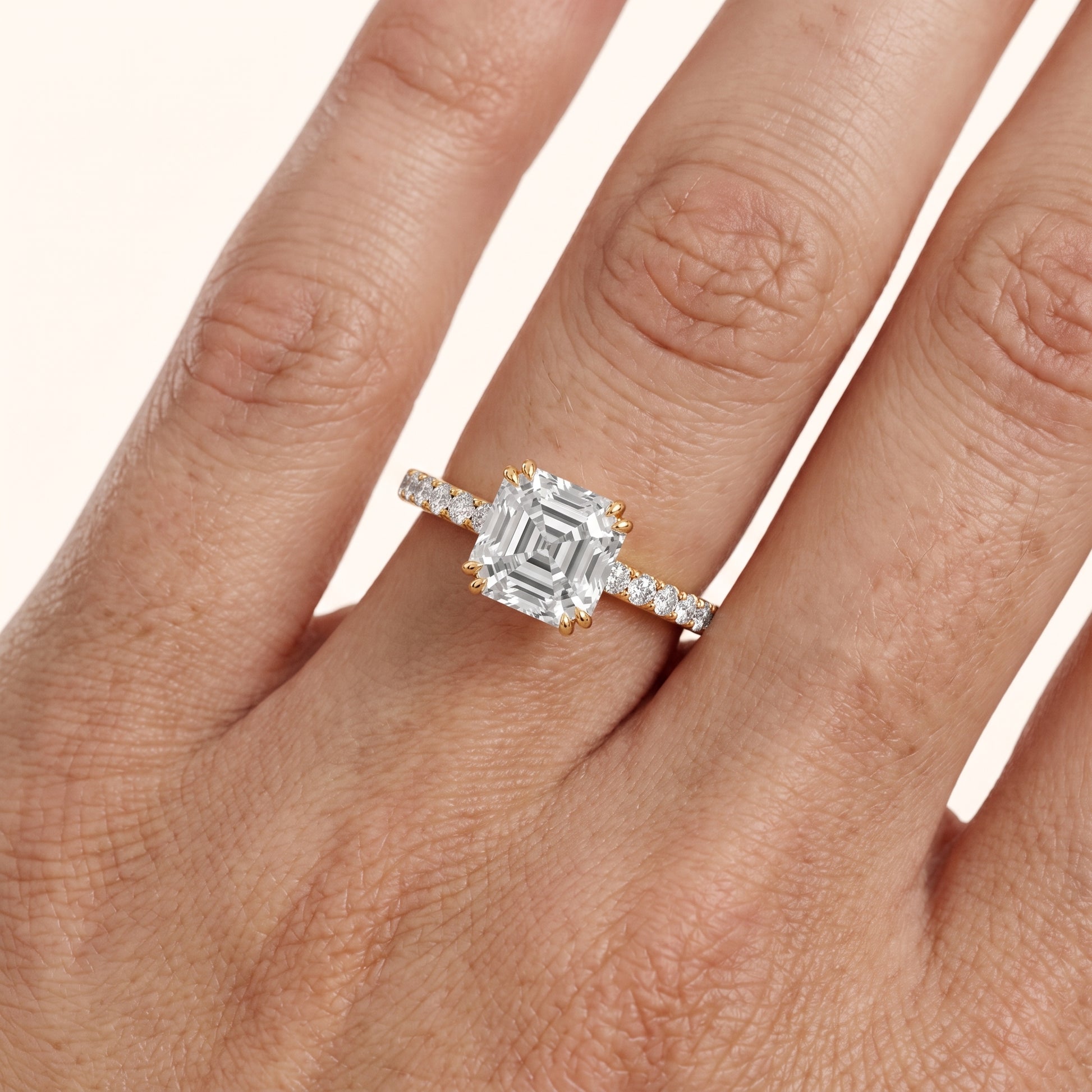 Novara Solitaire Pavé Asscher Diamond Ring in Yellow Gold - lifestyle.jpg