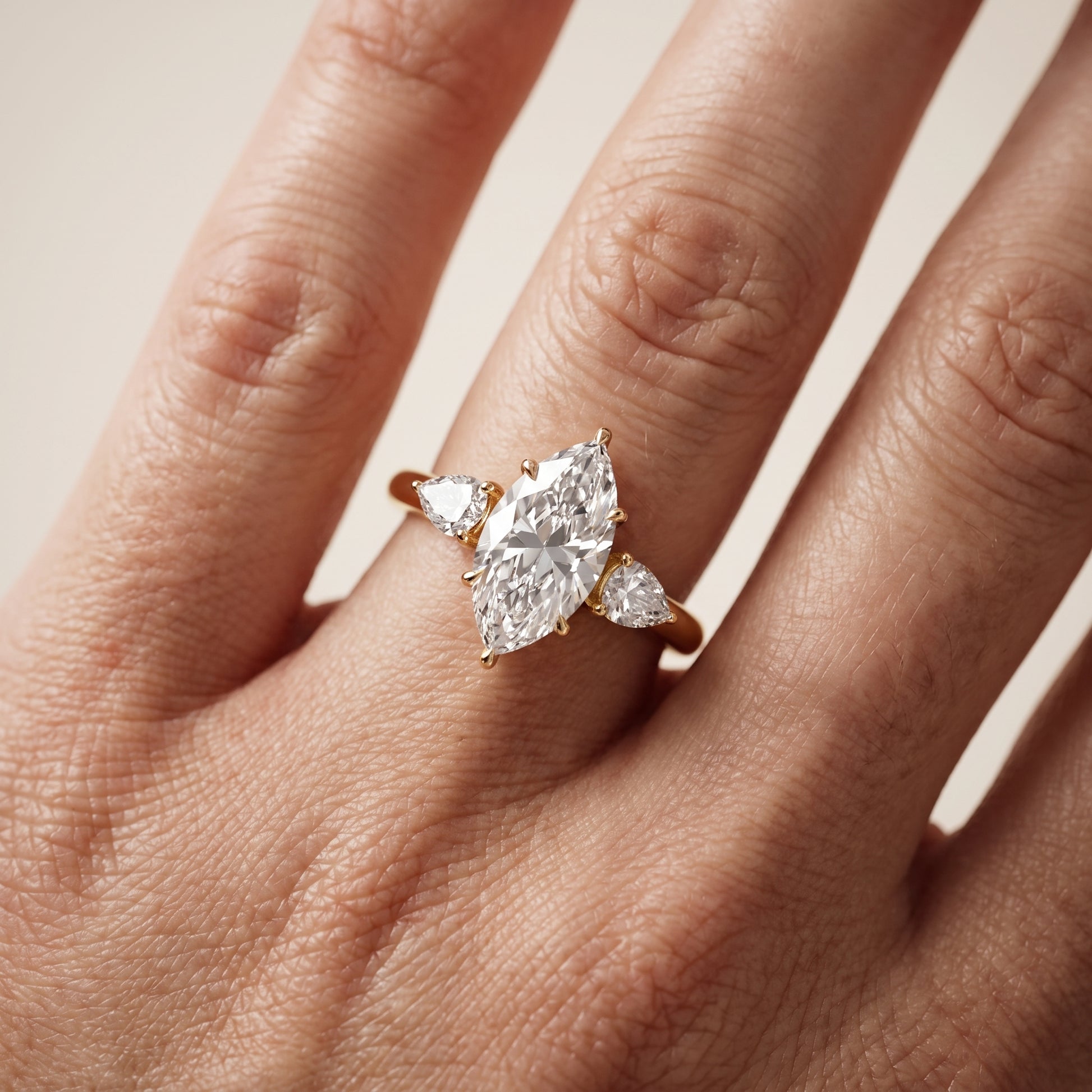 Phoebe Three-Stone Marquise Diamond Ring in Yellow Gold - lifestyle.jpg