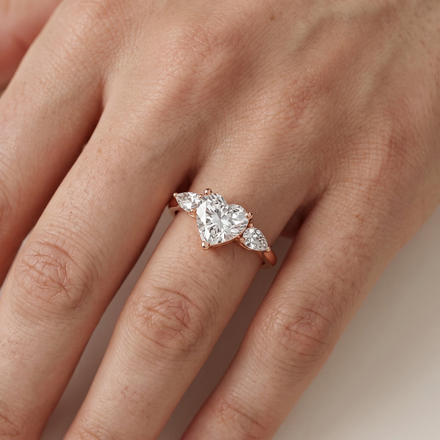 Faye Three-Stone Trellis Heart Diamond Ring in Rose Gold - lifestyle.jpg