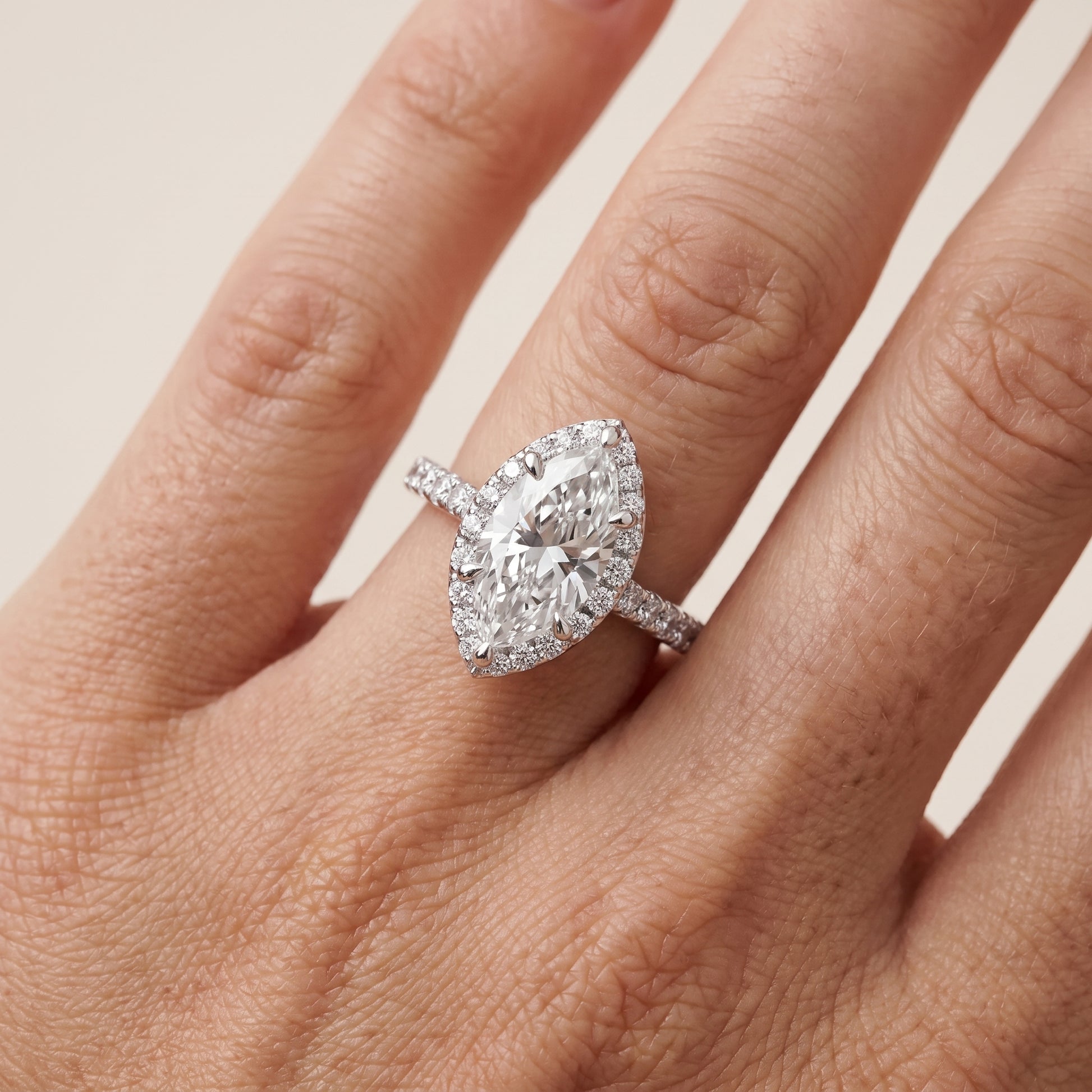 Amara Halo Claw Prong Marquise Diamond Ring in Platinum - lifestyle.jpg