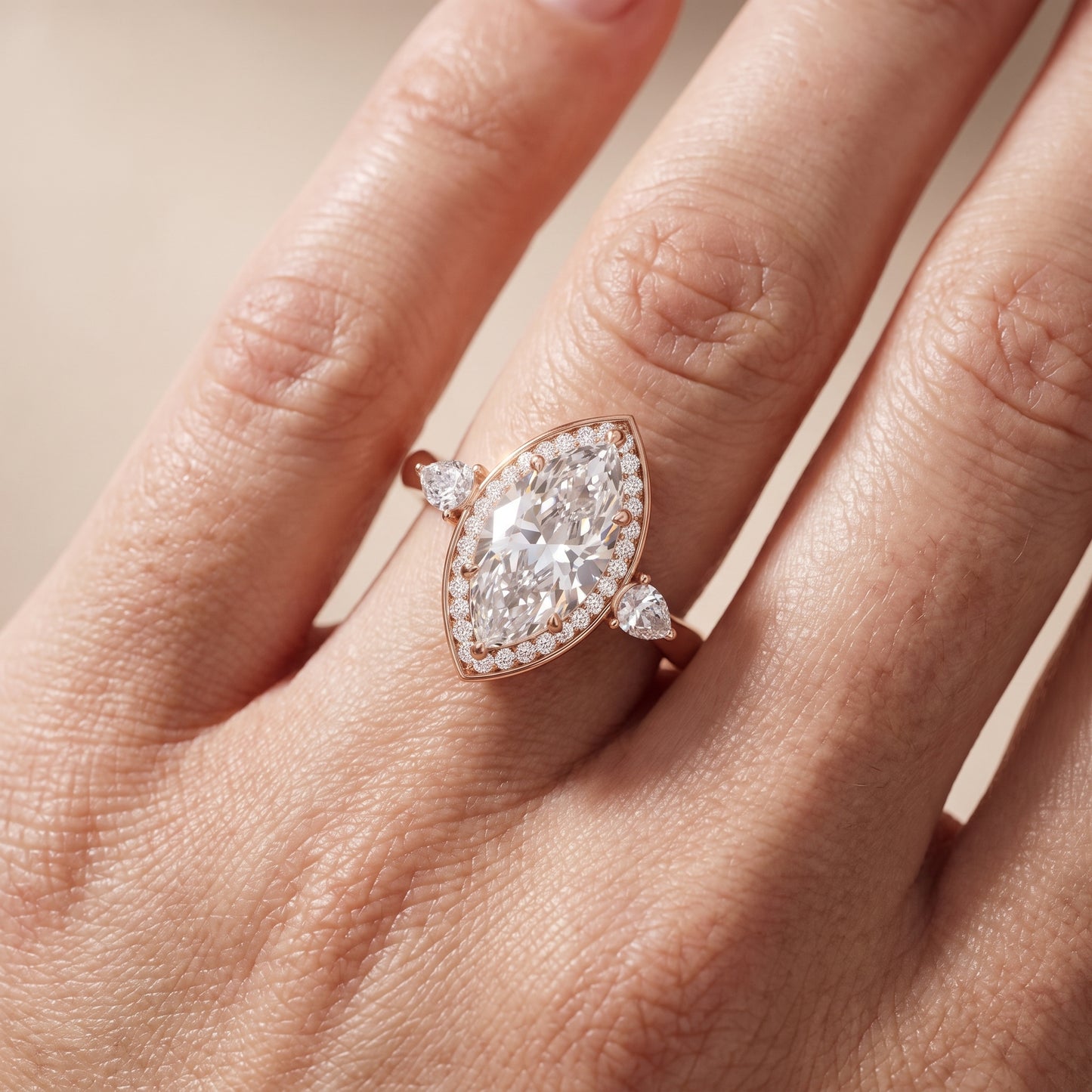 Eliza Halo Sidestone Marquise Diamond Engagement Ring in Rose Gold - lifestyle.jpg
