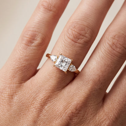 Phoebe Three-Stone Princess Diamond Ring in Yellow Gold - lifestyle.jpg