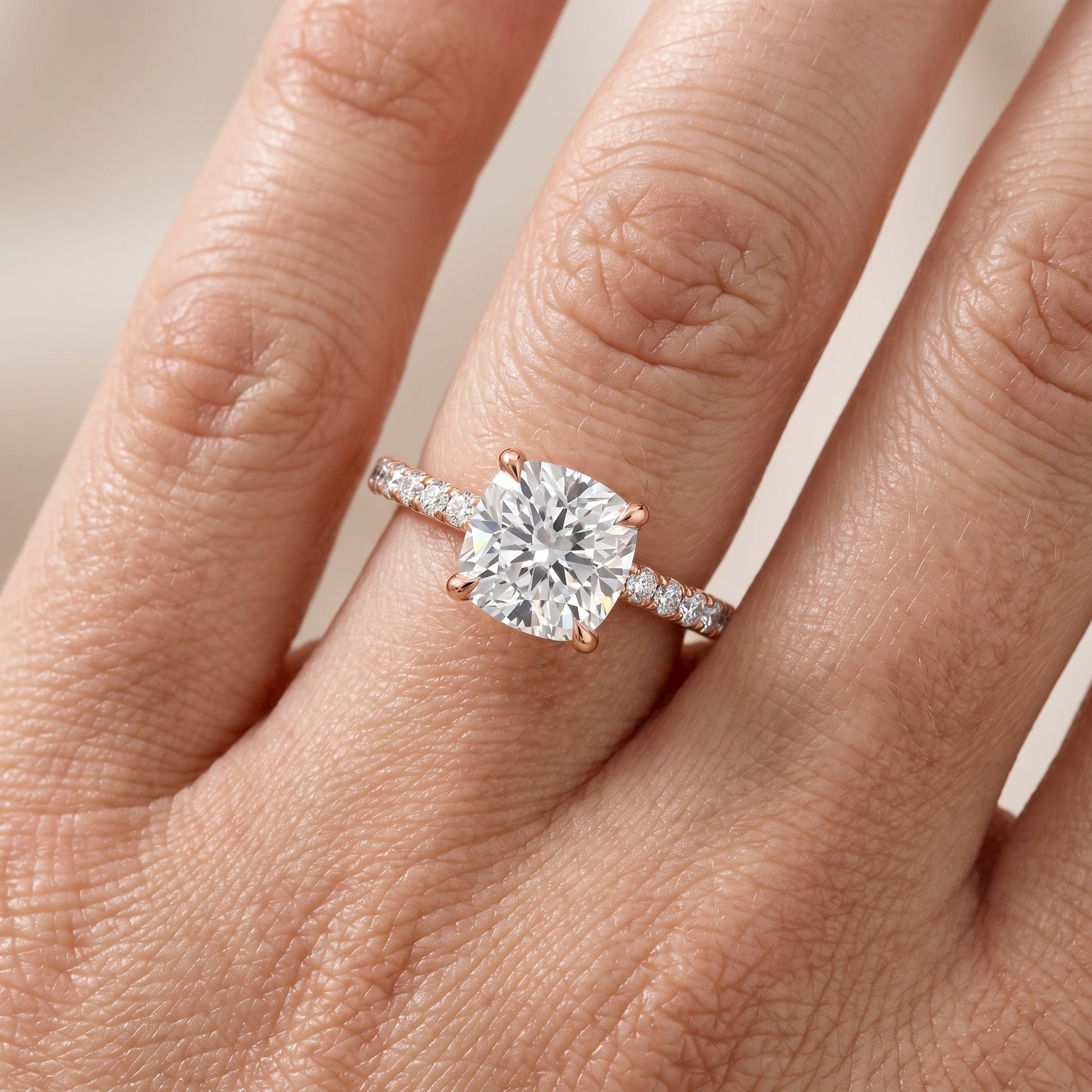 Ione Solitaire Pavé Cushion Diamond Engagement Ring in Rose Gold - lifestyle.jpg