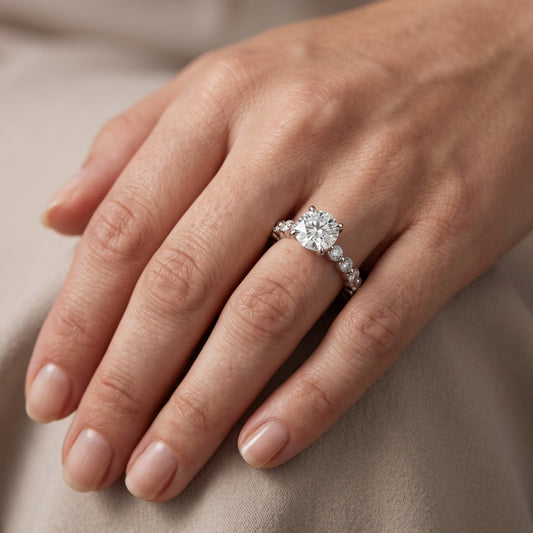 Piper Sidestone Round Diamond Engagement Ring in Platinum - lifestyle.jpg