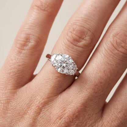Romy Three-Stone Round Diamond Engagement Ring in Platinum - lifestyle.jpg