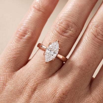 Lucia Solitaire Six-Prong Marquise Diamond Engagement Ring in Rose Gold - lifestyle.jpg