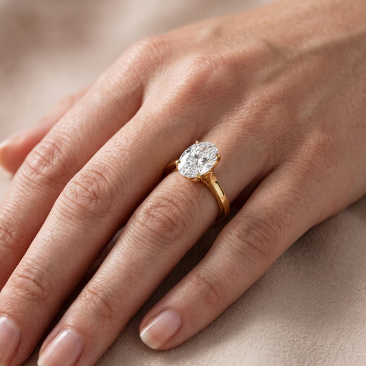 Isabella Bloom Solitaire Oval Diamond Engagement Ring in Yellow Gold - lifestyle.jpg