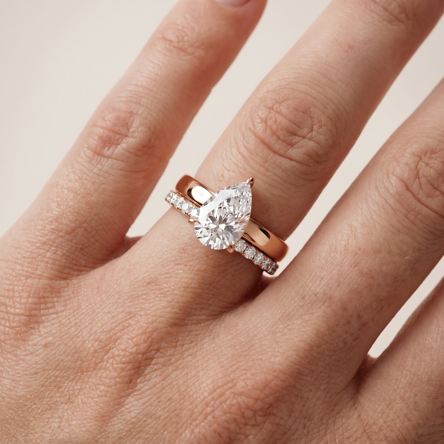 Veda Split Shank Pavé Pear Diamond Engagement Ring in Rose Gold - lifestyle.jpg