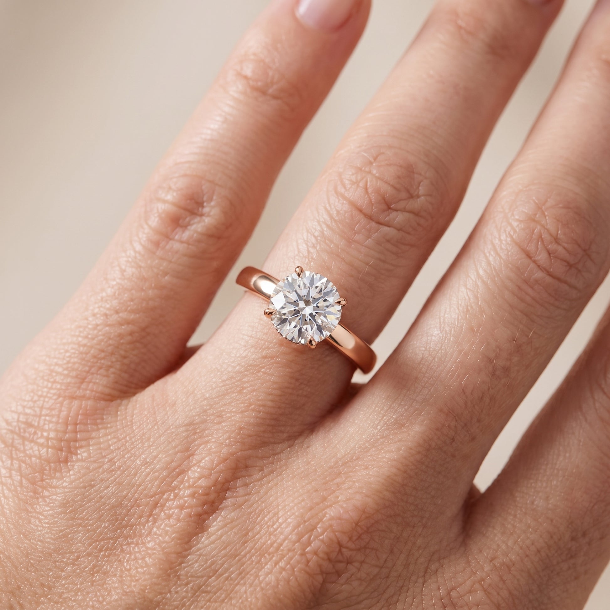 Lara Hidden Halo Round Diamond Engagement Ring in Rose Gold - lifestyle.jpg