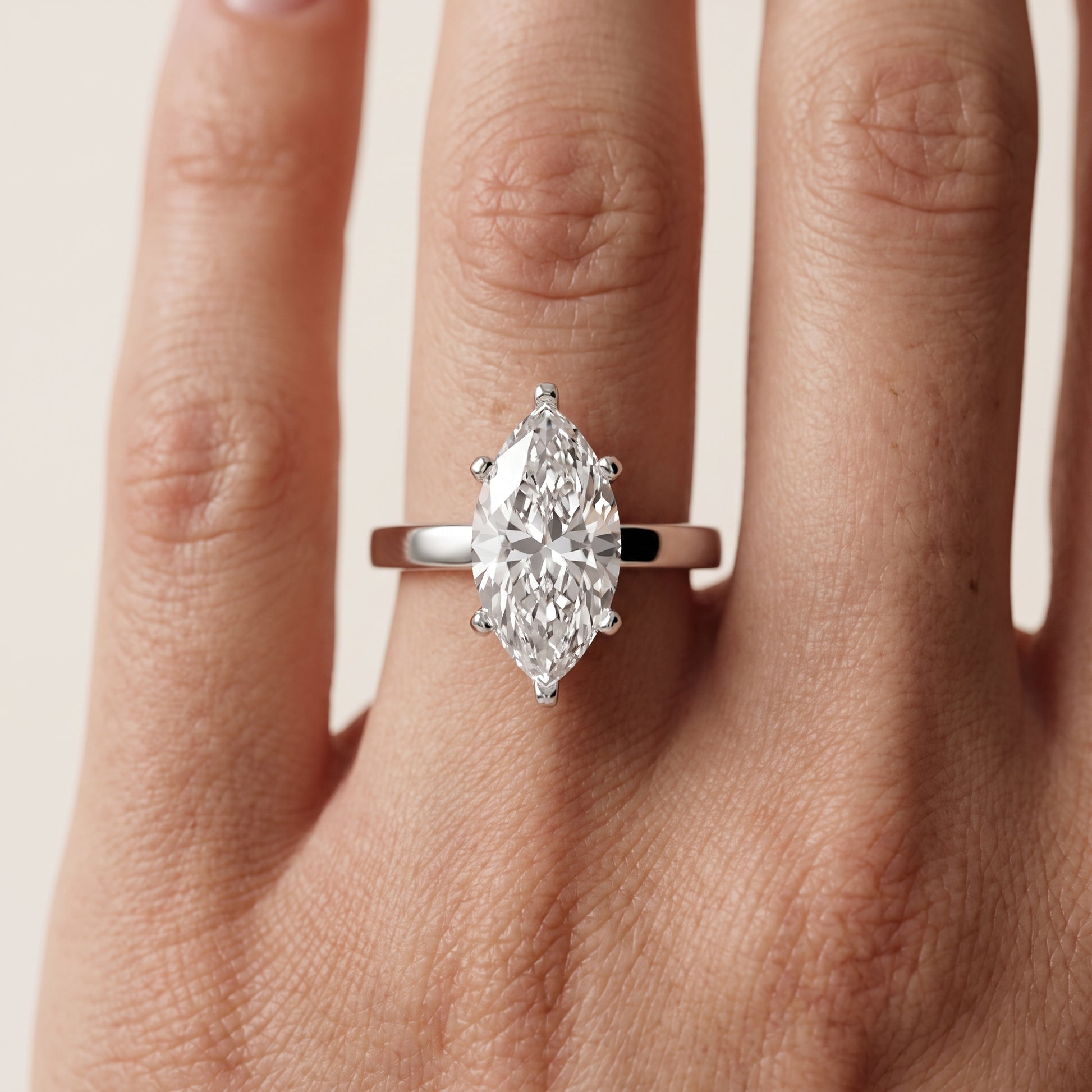 Delia Solitaire Marquise Diamond Engagement Ring in White Gold - lifestyle.jpg