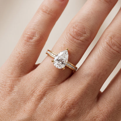 Tessa Solitaire Channel Set Pear Diamond Engagement Ring in Yellow Gold - lifestyle.jpg