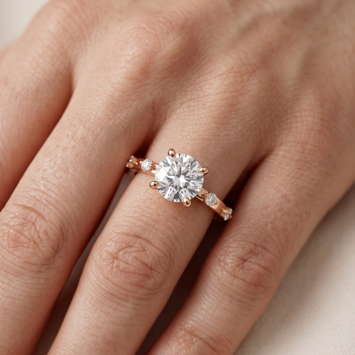 Elena Radiance Solitaire Round Diamond Engagement Ring in Rose Gold - lifestyle.jpg