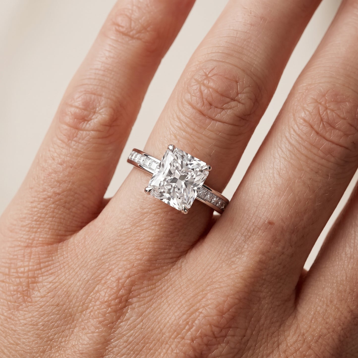 Maren Sidestone Channel Set Radiant Diamond Engagement Ring in Platinum - lifestyle.jpg