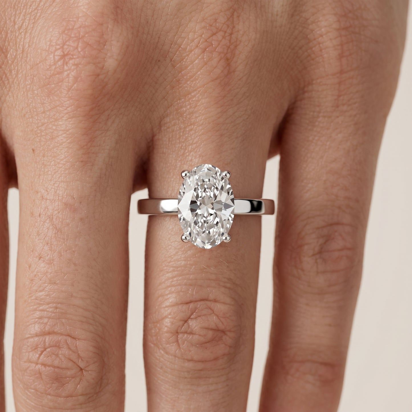 Delia Solitaire Oval Diamond Engagement Ring in Platinum - lifestyle.jpg