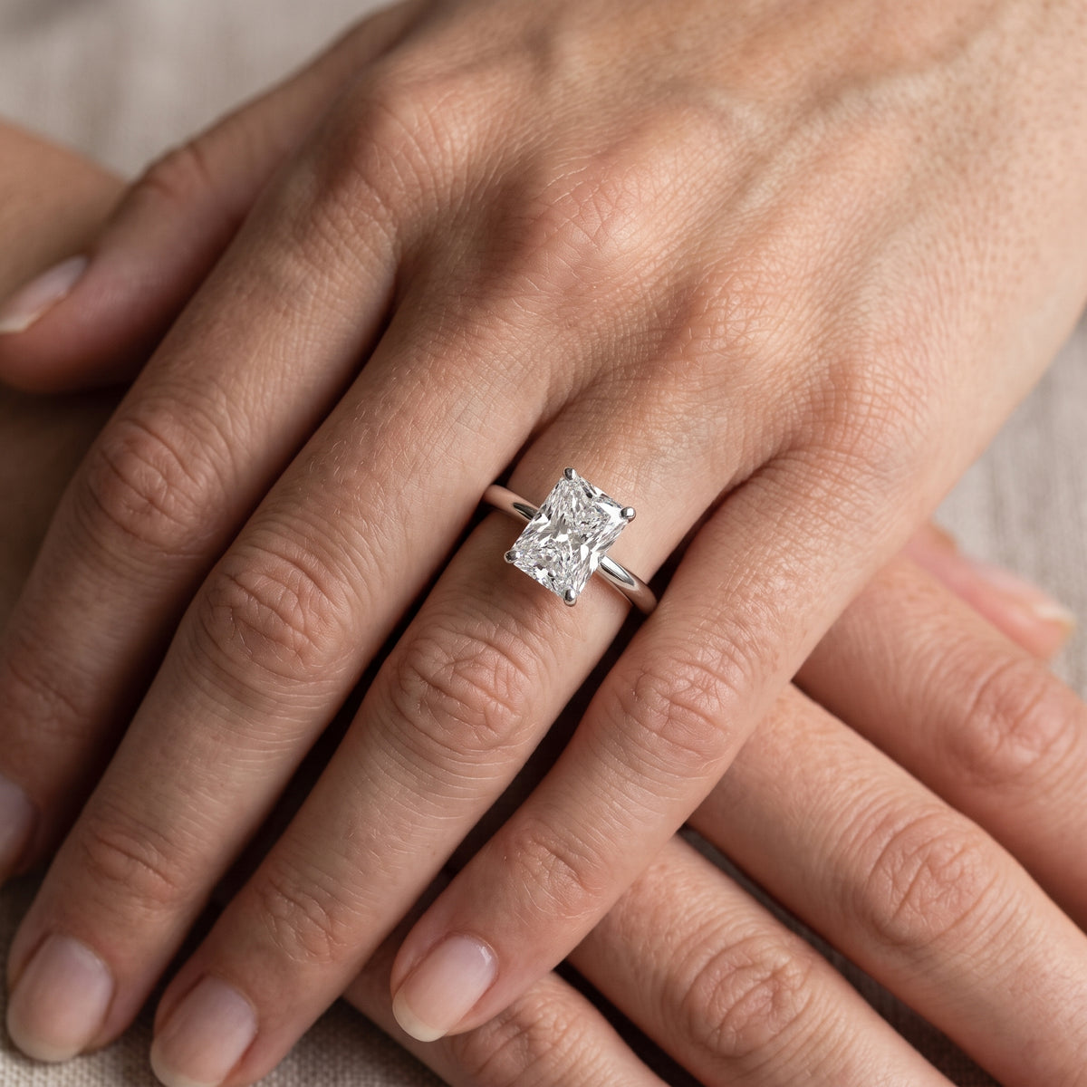 Elena Solitaire Radiant Diamond Engagement Ring in Silver - lifestyle.jpg