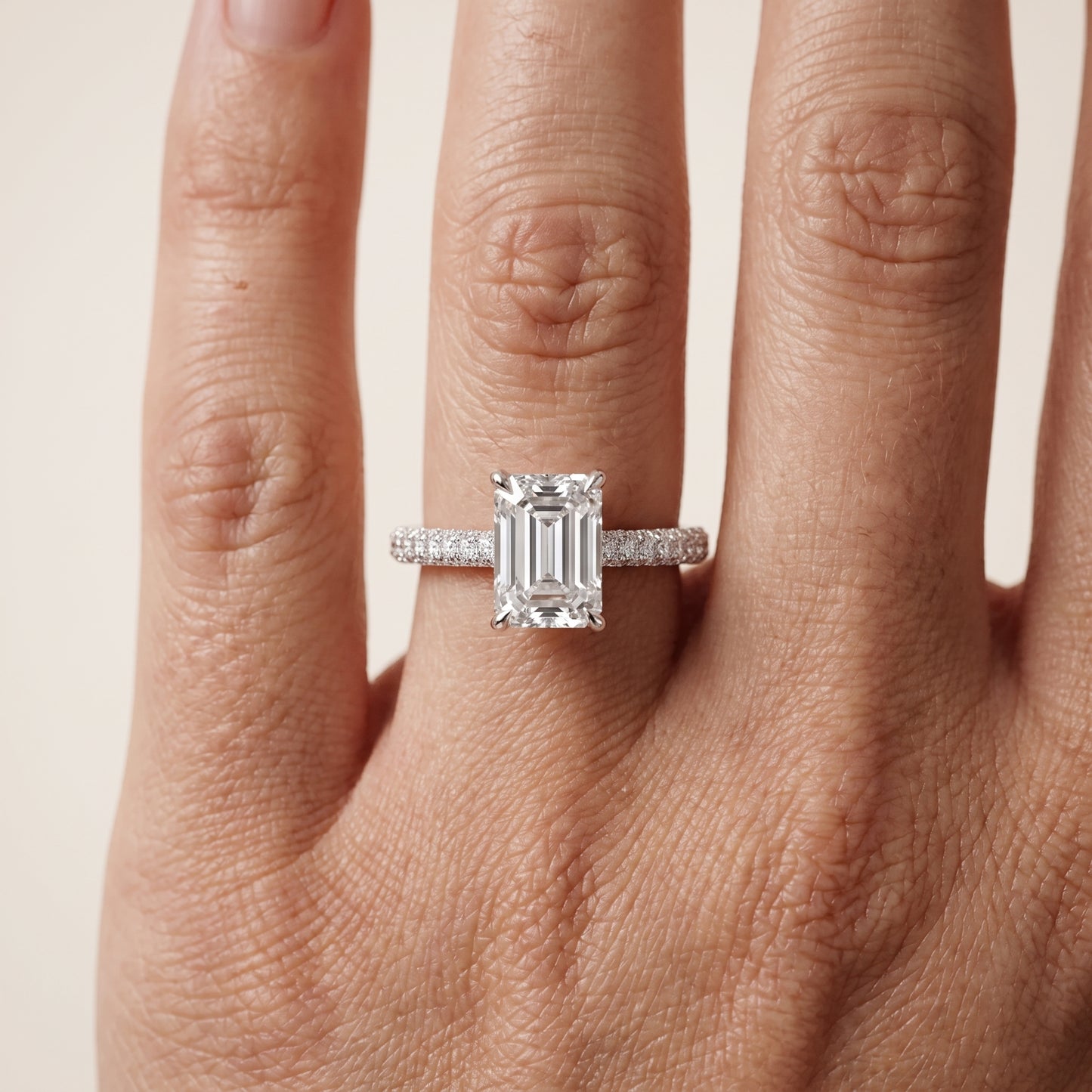 Della Hidden Halo Pavé Emerald Diamond Engagement Ring in Platinum - lifestyle.jpg