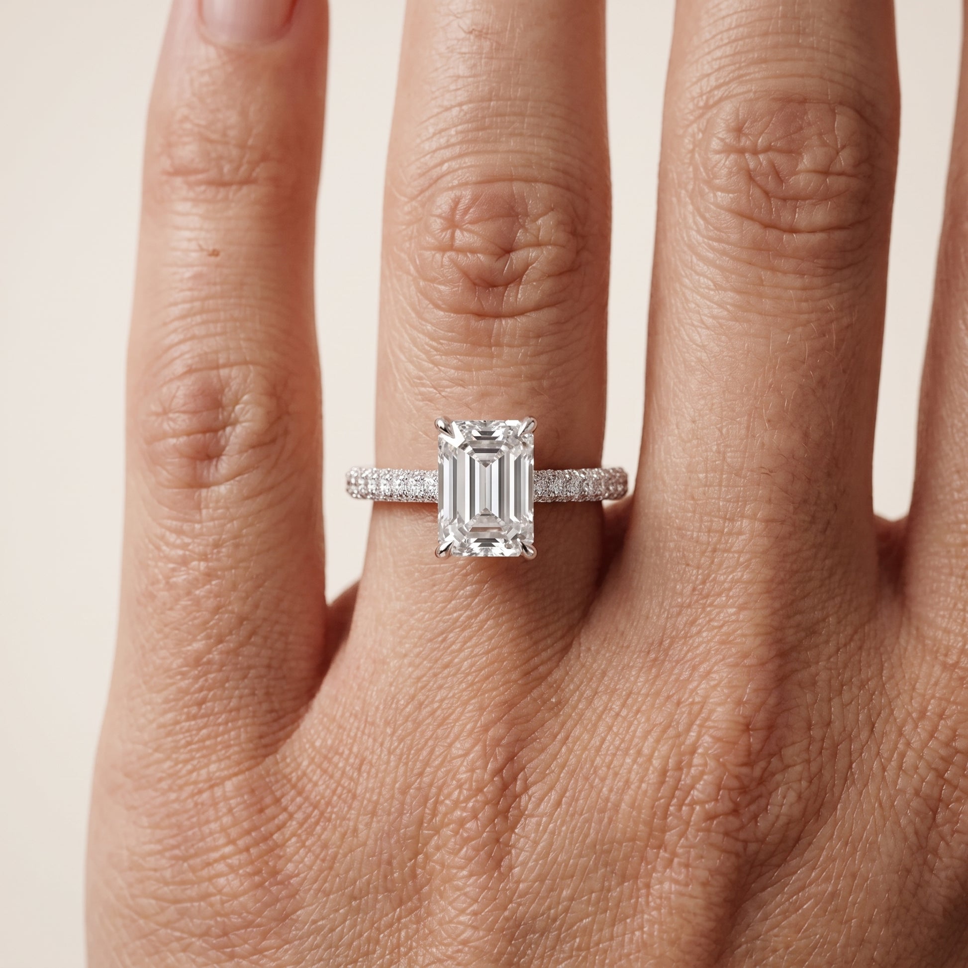 Della Hidden Halo Pavé Emerald Diamond Engagement Ring in Platinum - lifestyle.jpg