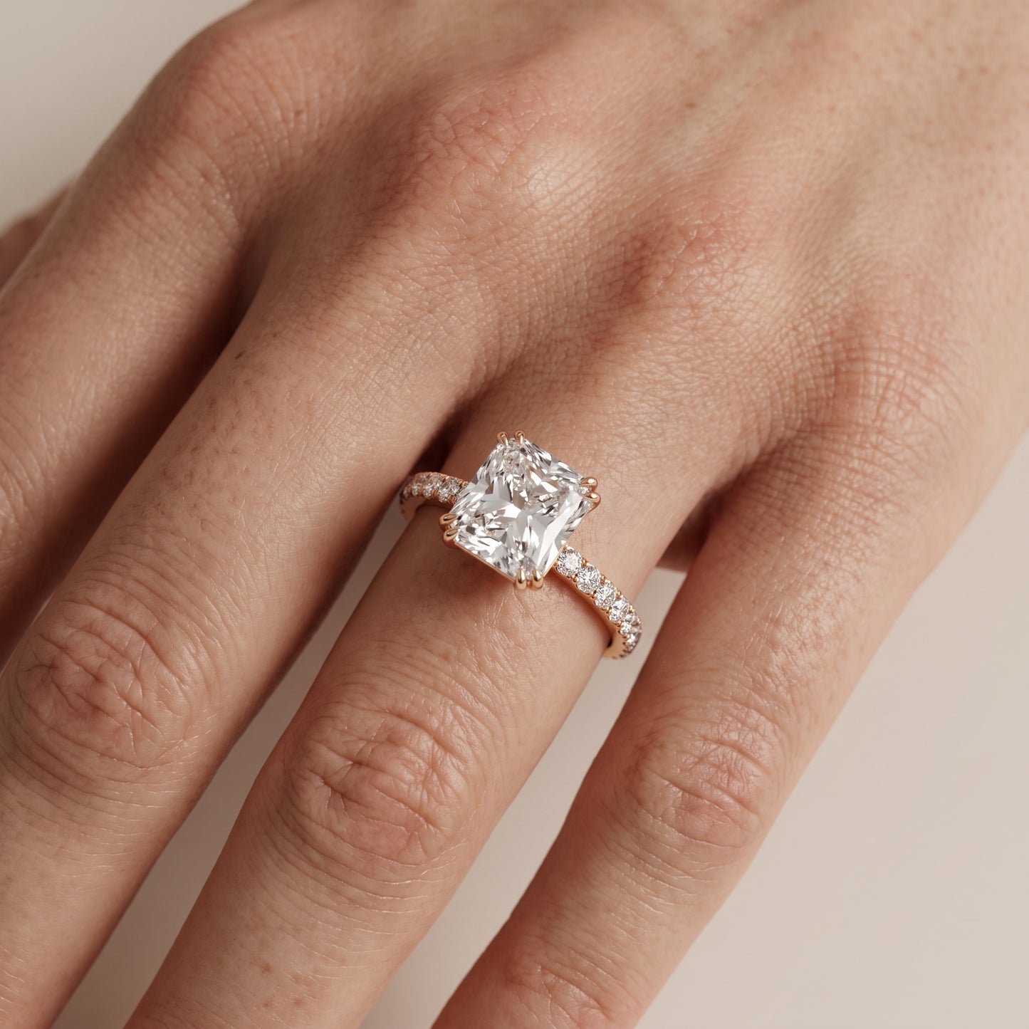 Novara Solitaire Pavé Radiant Diamond Ring in Rose Gold - lifestyle.jpg