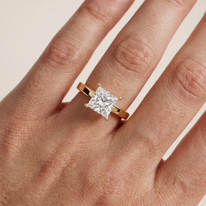 Delia Solitaire Princess Diamond Engagement Ring in Yellow Gold - lifestyle.jpg