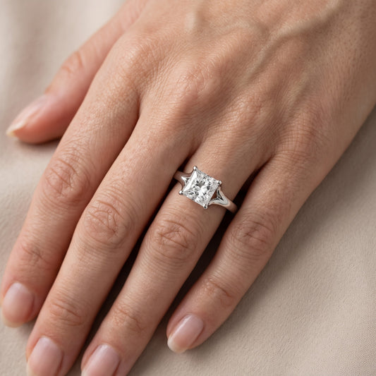 Nell Split Shank Solitaire Princess Diamond Engagement Ring in Platinum - lifestyle.jpg