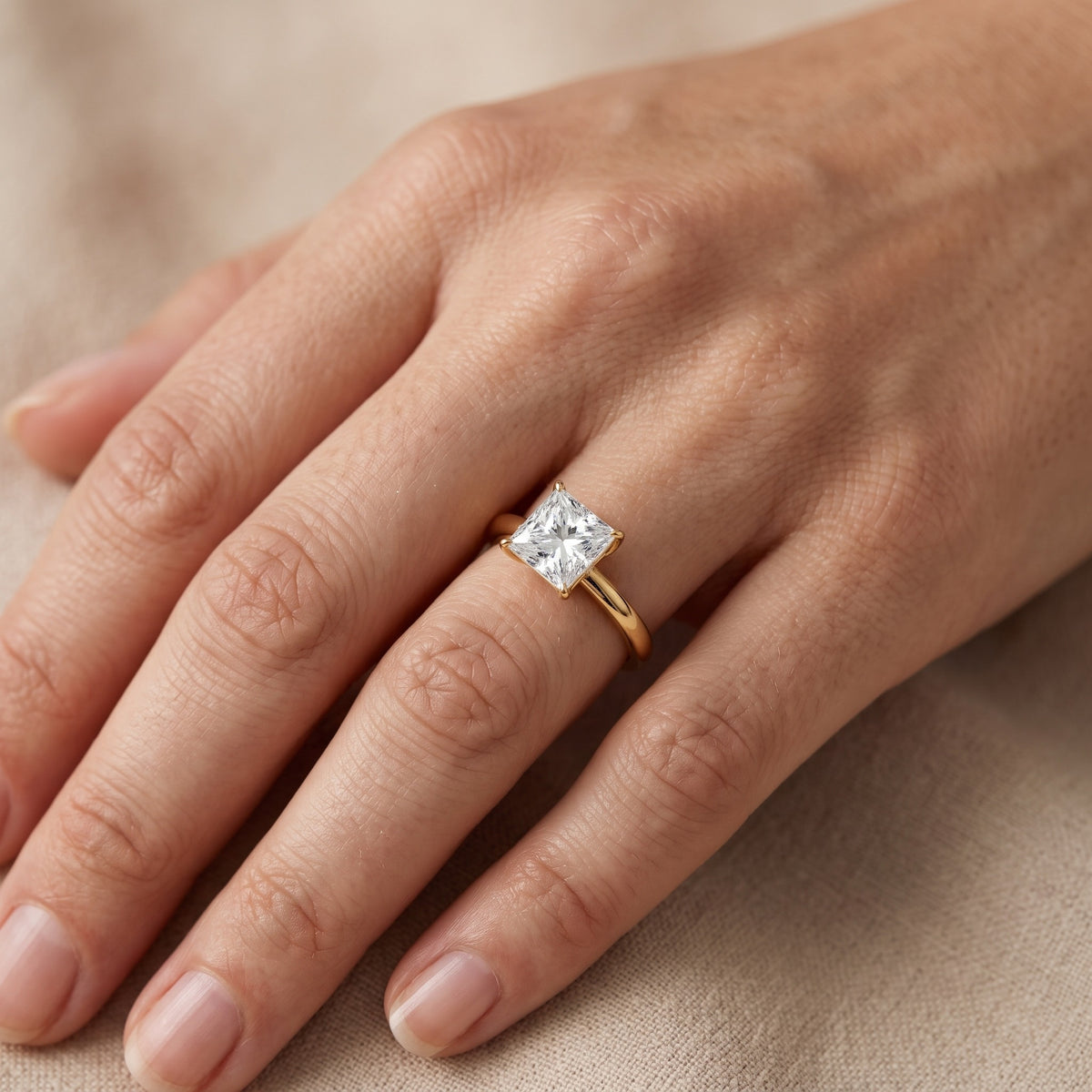 Serena Blossom Solitaire Princess Diamond Engagement Ring in Yellow Gold - lifestyle.jpg