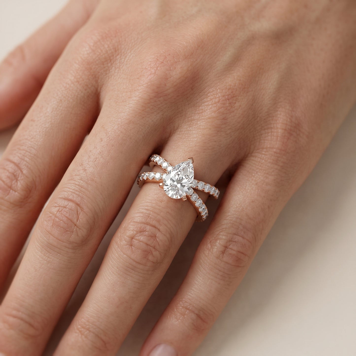 Lior Criss Cross Pavé Pear Diamond Engagement Ring in Rose Gold - lifestyle.jpg