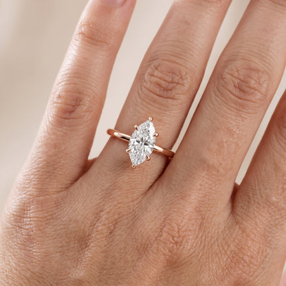 Nella Petite Solitaire Marquise Diamond Engagement Ring in Rose Gold - lifestyle.jpg