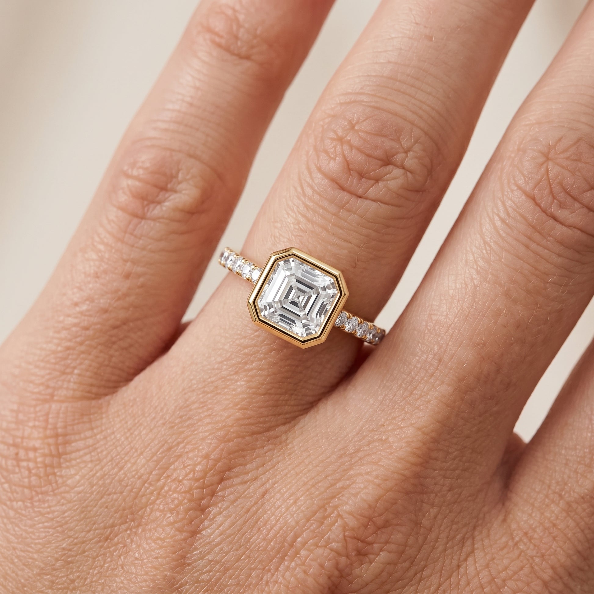 Cora Bezel Pavé Asscher Diamond Ring in Yellow Gold - lifestyle.jpg