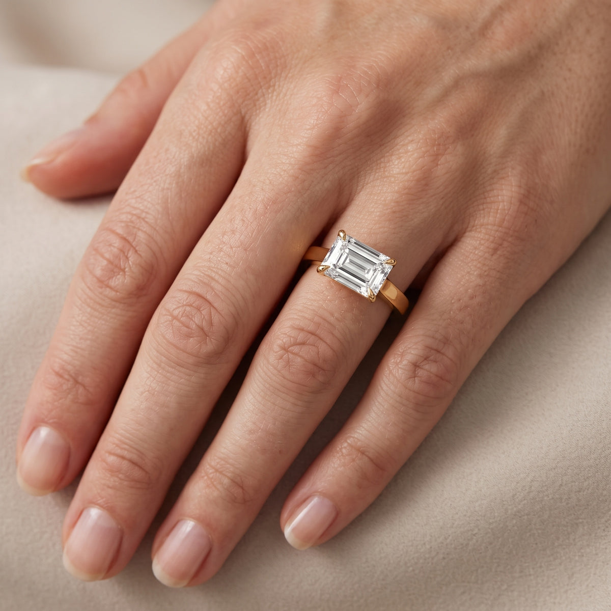 Truckee East-West Cathedral Emerald Diamond Engagement Ring in Silver - lifestyle.jpg