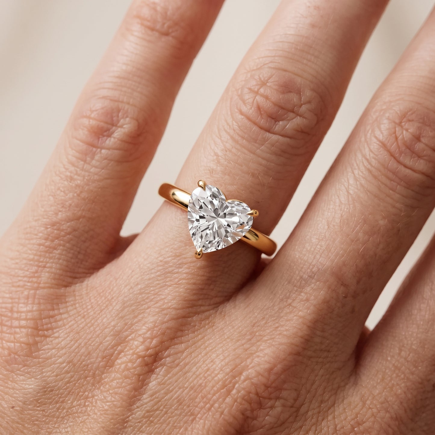 Lyla Petite Solitaire Heart Diamond Engagement Ring in Yellow Gold - lifestyle.jpg