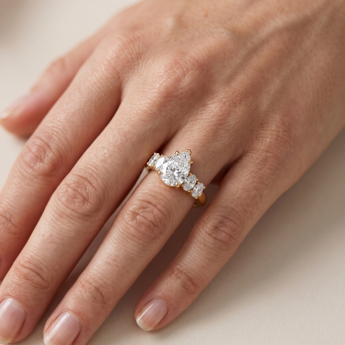 Kirsten Graduated Five-Stone Pear Diamond Engagement Ring in Silver - lifestyle.jpg